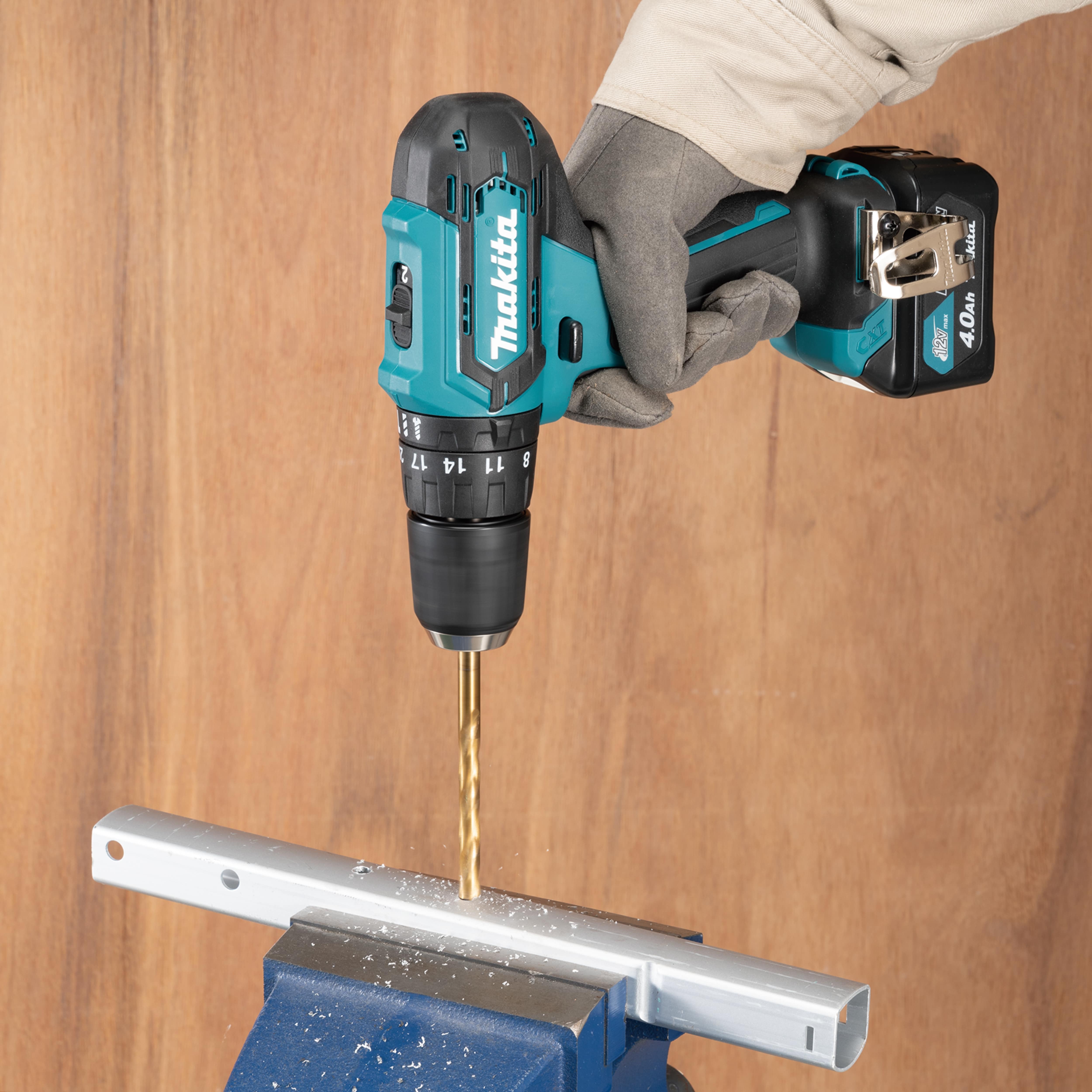 Masina de gaurit si insurubat cu percutie Makita HP333DSME, acumulator 12V, 2 x 4Ah