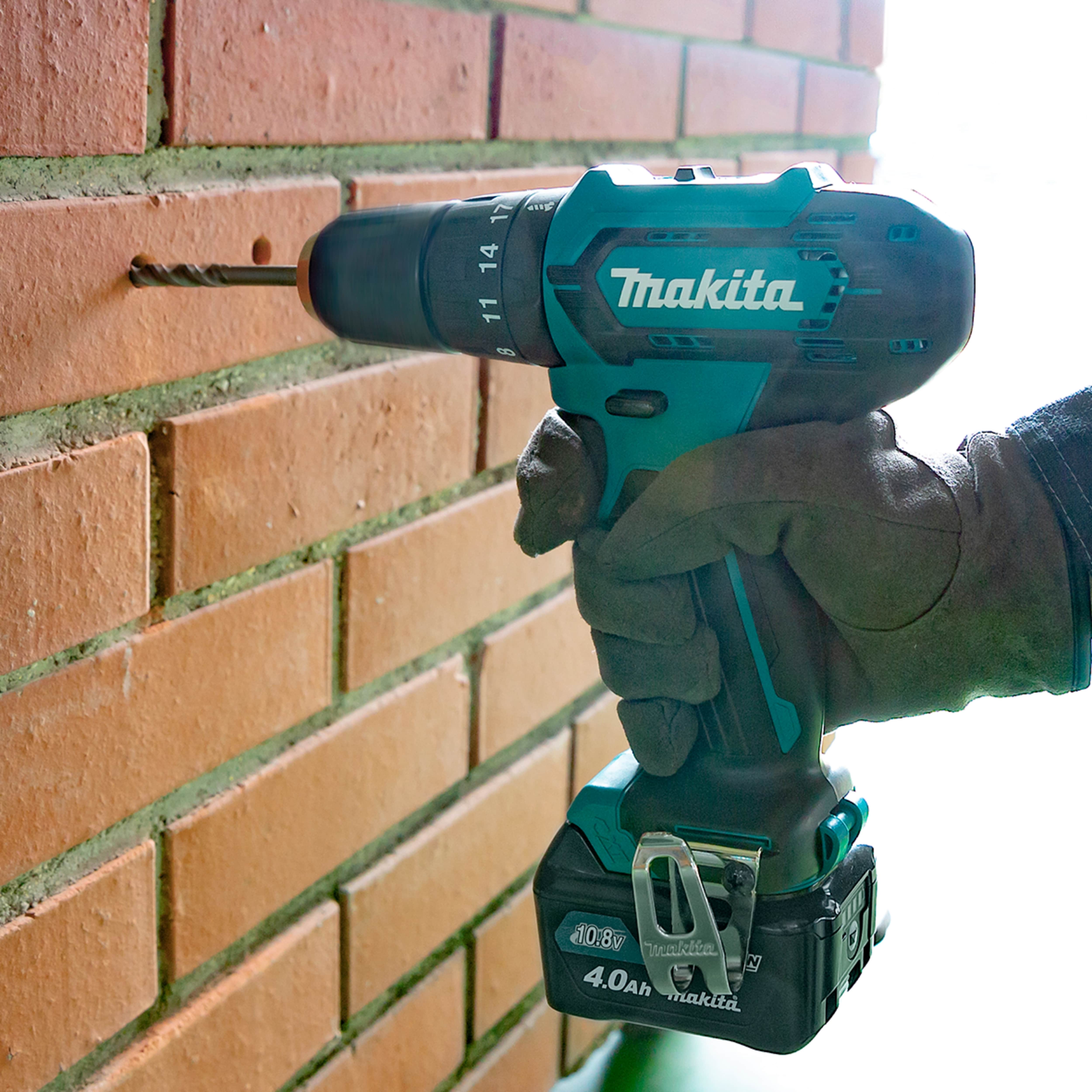 Masina de gaurit si insurubat cu percutie Makita HP333DSME, acumulator 12V, 2 x 4Ah